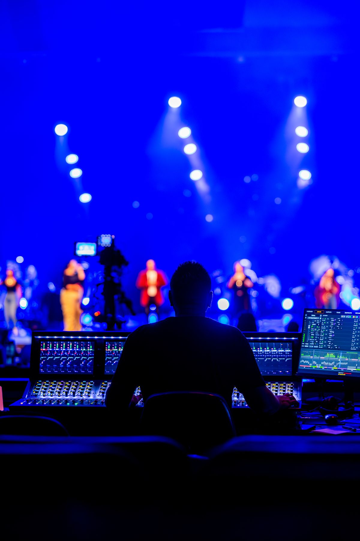 Event stage with a lit audience