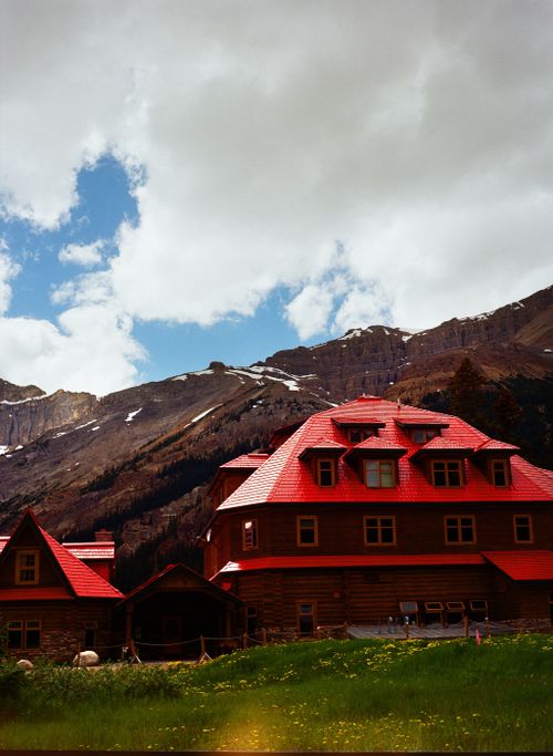 Free Charming lodge set against the majestic Canadian Rockies in Lake Louise, Alberta. Stock Photo