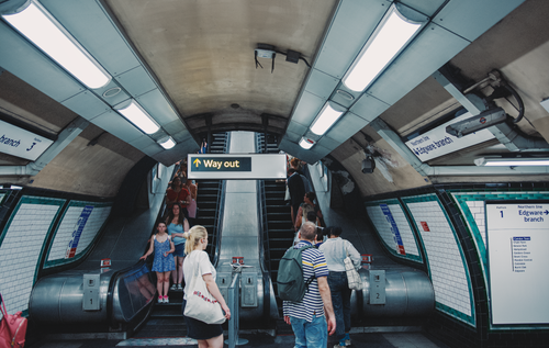 Free People using an escalator in London Underground station, Edgware branch. Stock Photo
