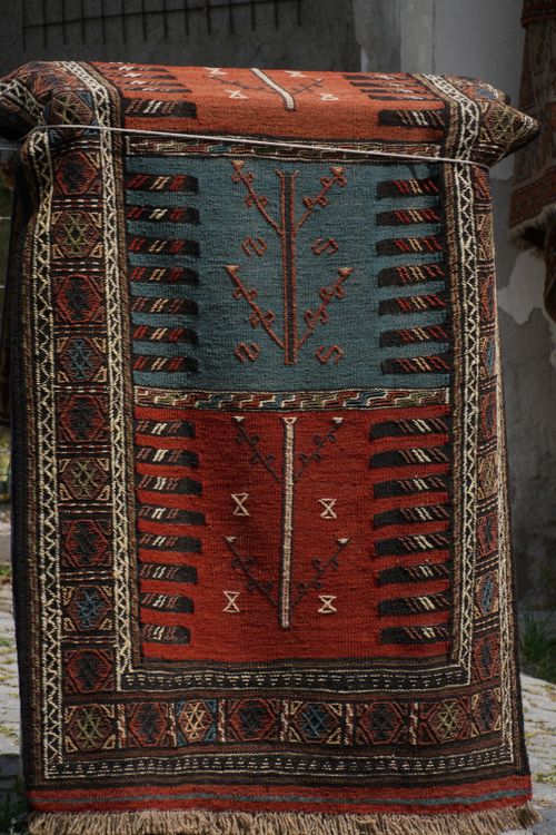 Free Colorful Turkish rug displayed outdoors in Ankara, featuring intricate patterns. Stock Photo