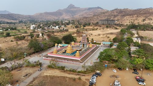 Free Explore the stunning aerial view of a temple nestled in the picturesque Raigad valley, Maharashtra. Stock Photo