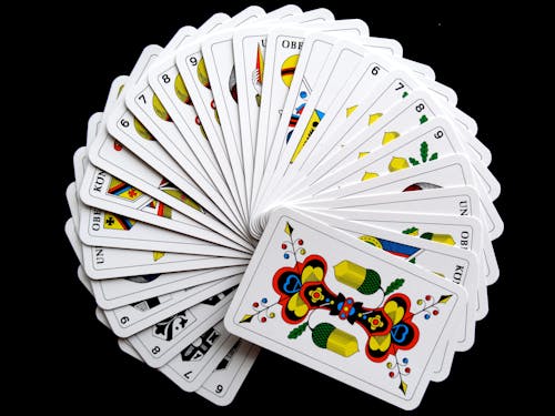 Free White and Yellow Playing Cards Stock Photo