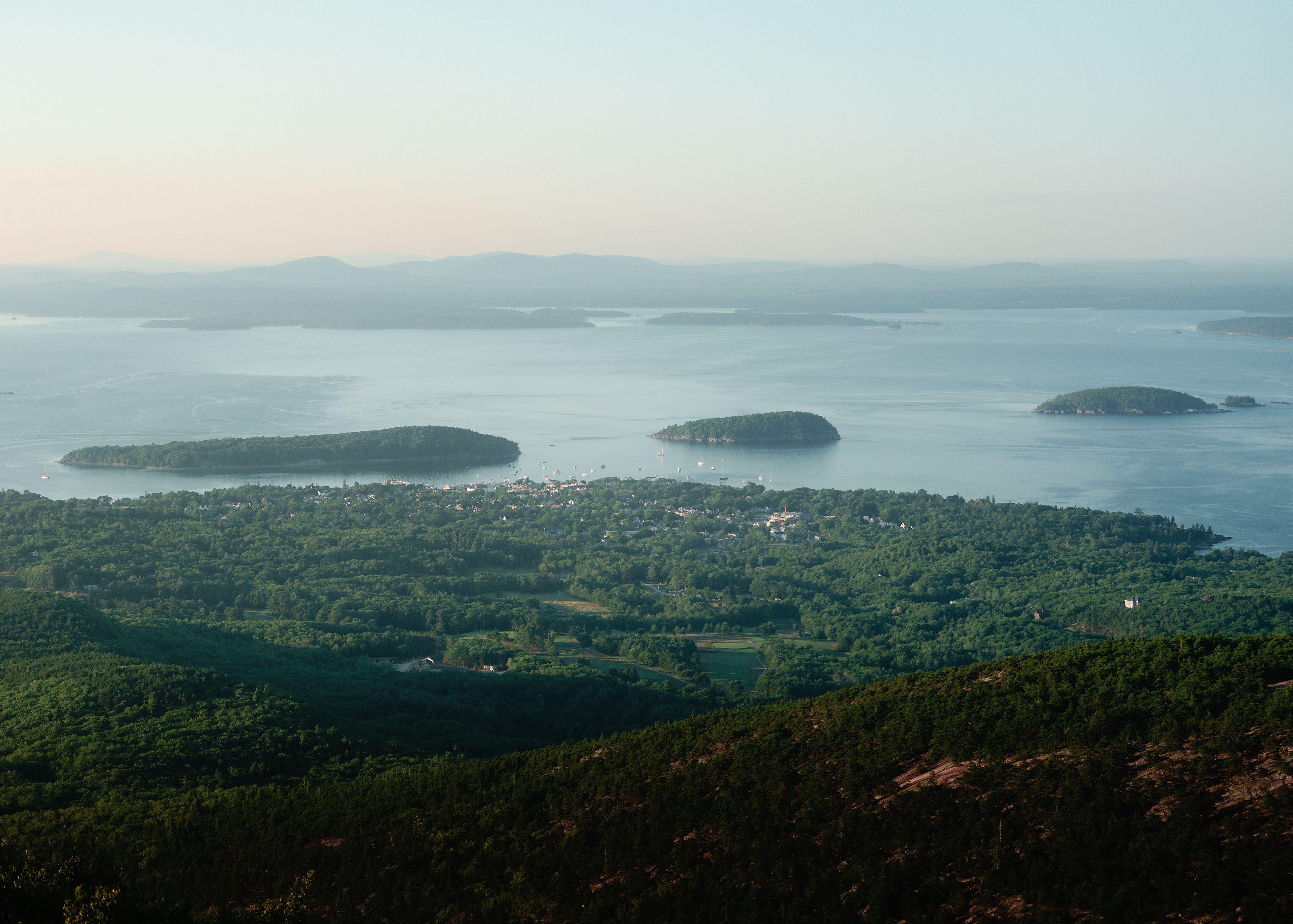 Breathtaking aerial view of Bar Harbor and islands from Cadillac Mountain in Acadia National Park.