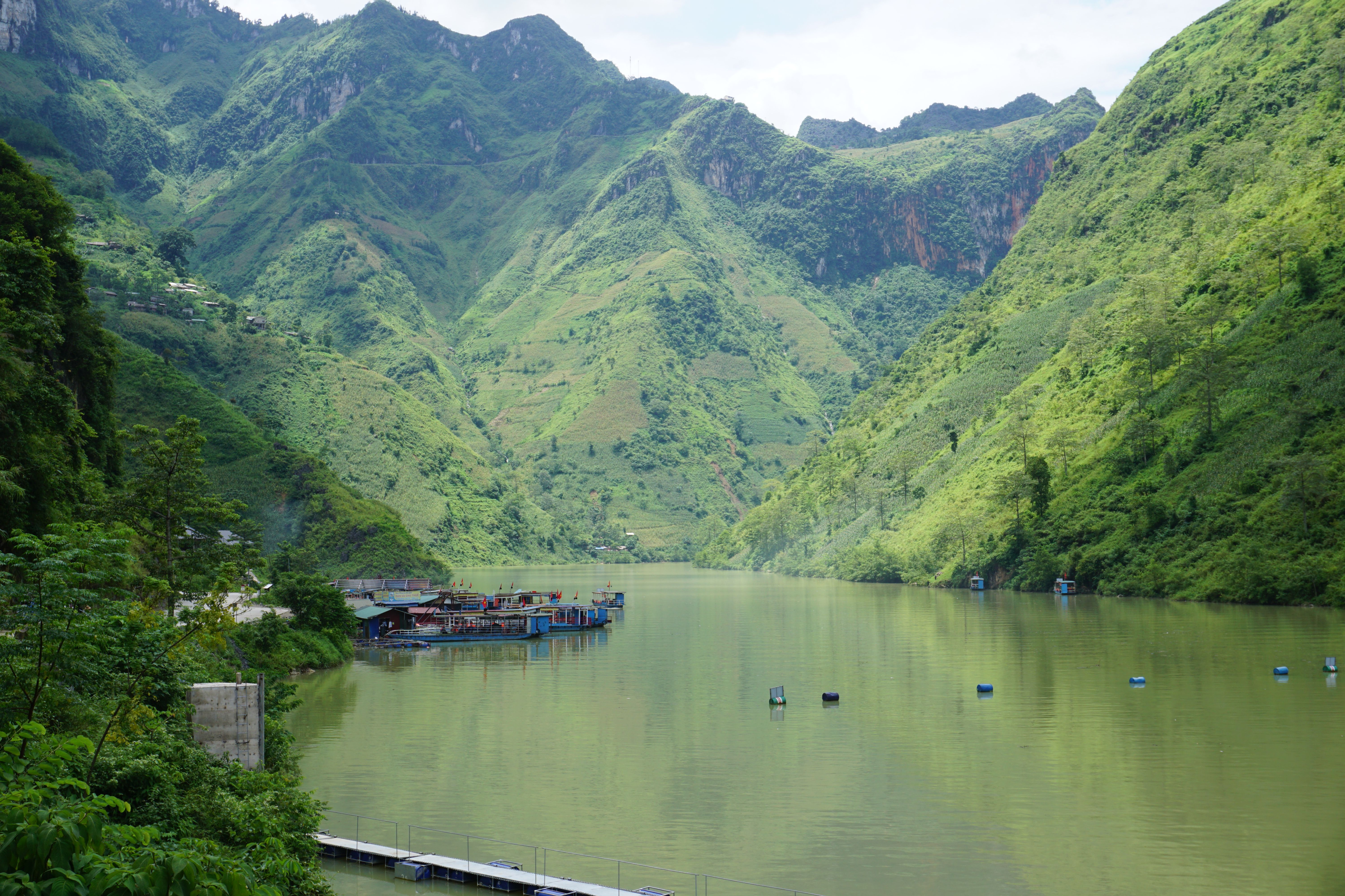 Idyllic river and karst mountain landscape in Meo Vac, Vietnam.