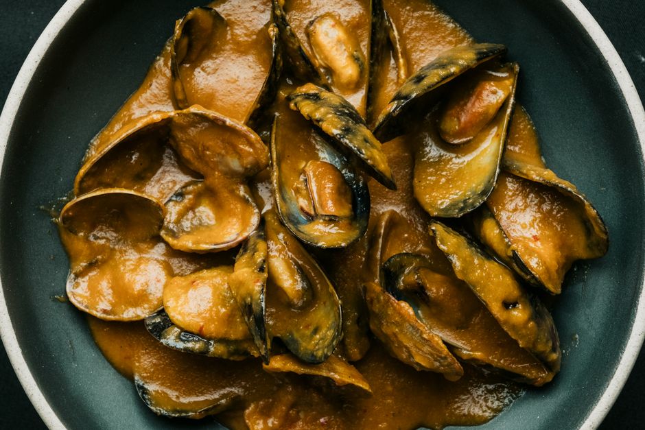 Gourmet mussels in a rich sauce served in a Calgary high-end restaurant.