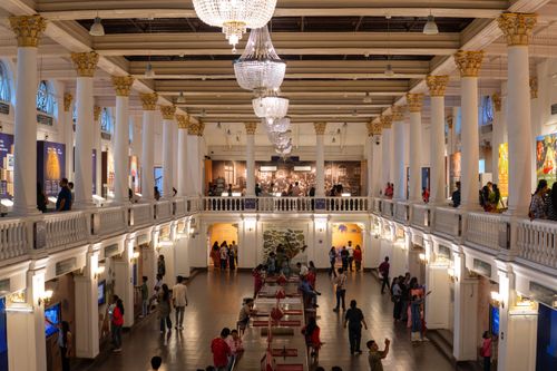 Free Stunning view of Indian Museum's grand hall in Kolkata with visitors exploring exhibits. Stock Photo