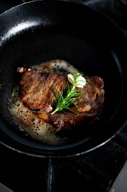 Searing means cooking a food's surface over high heat until it browns deeply, without necessarily cooking it through. Why it works and how to get it right.