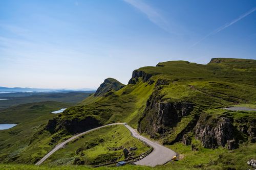 Free Breathtaking view of the Quiraing mountains in Scotland under a clear blue sky. Stock Photo
