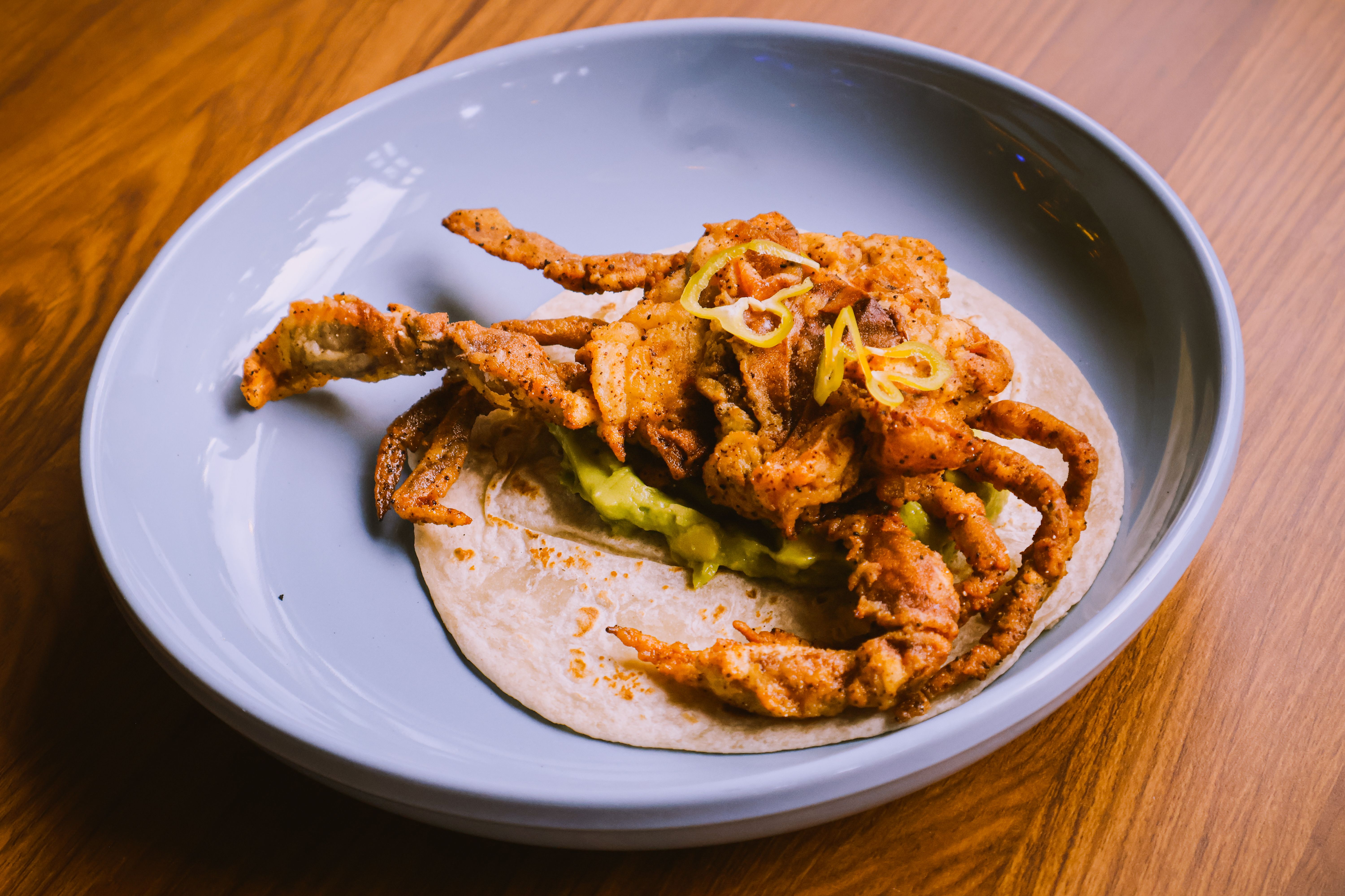 Crispy soft-shell crab salad with green mango and chilli dressing