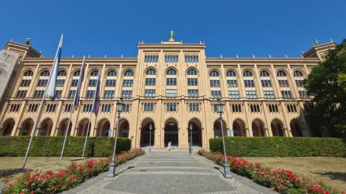 Free The historic Maximilianeum building in Munich under a clear blue sky. Stock Photo