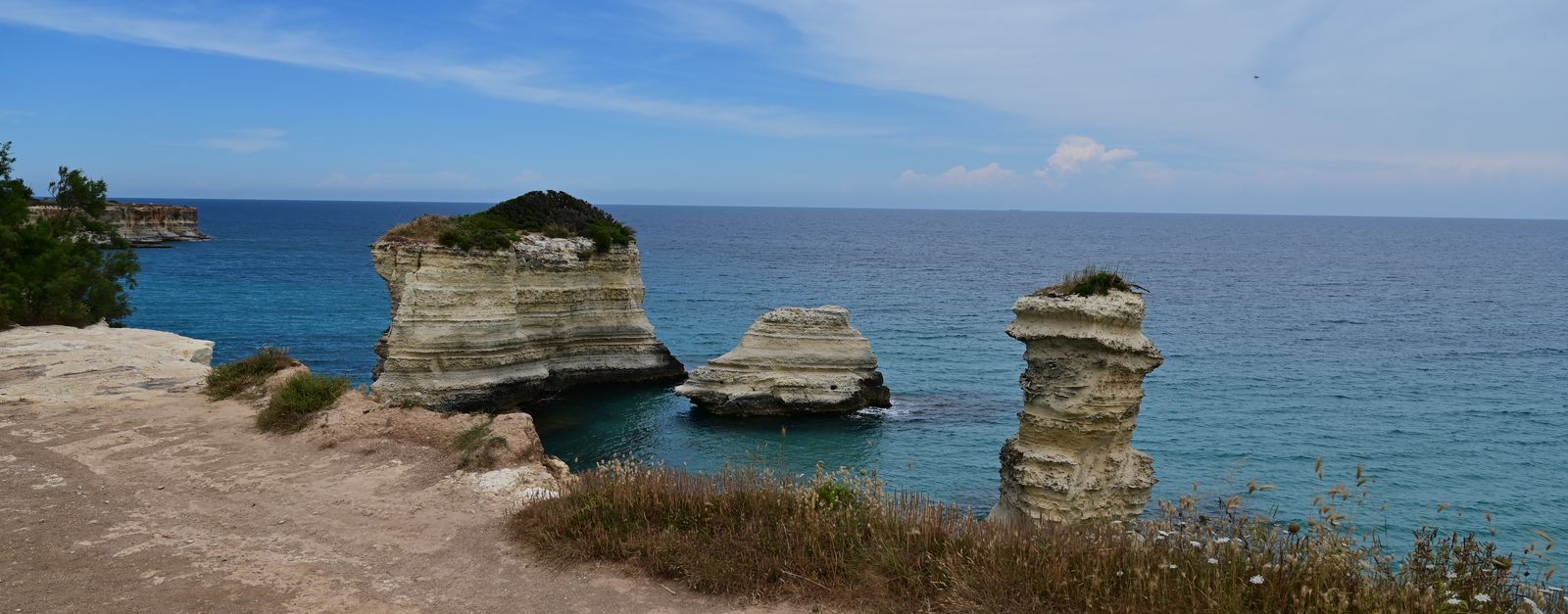 Stunning cliffside rock formations by the sea in Otranto, Italy.