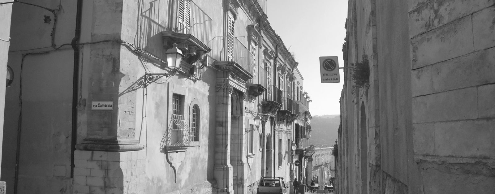 Charming street view in Ragusa, Sicily with baroque architecture, capturing Italian heritage.