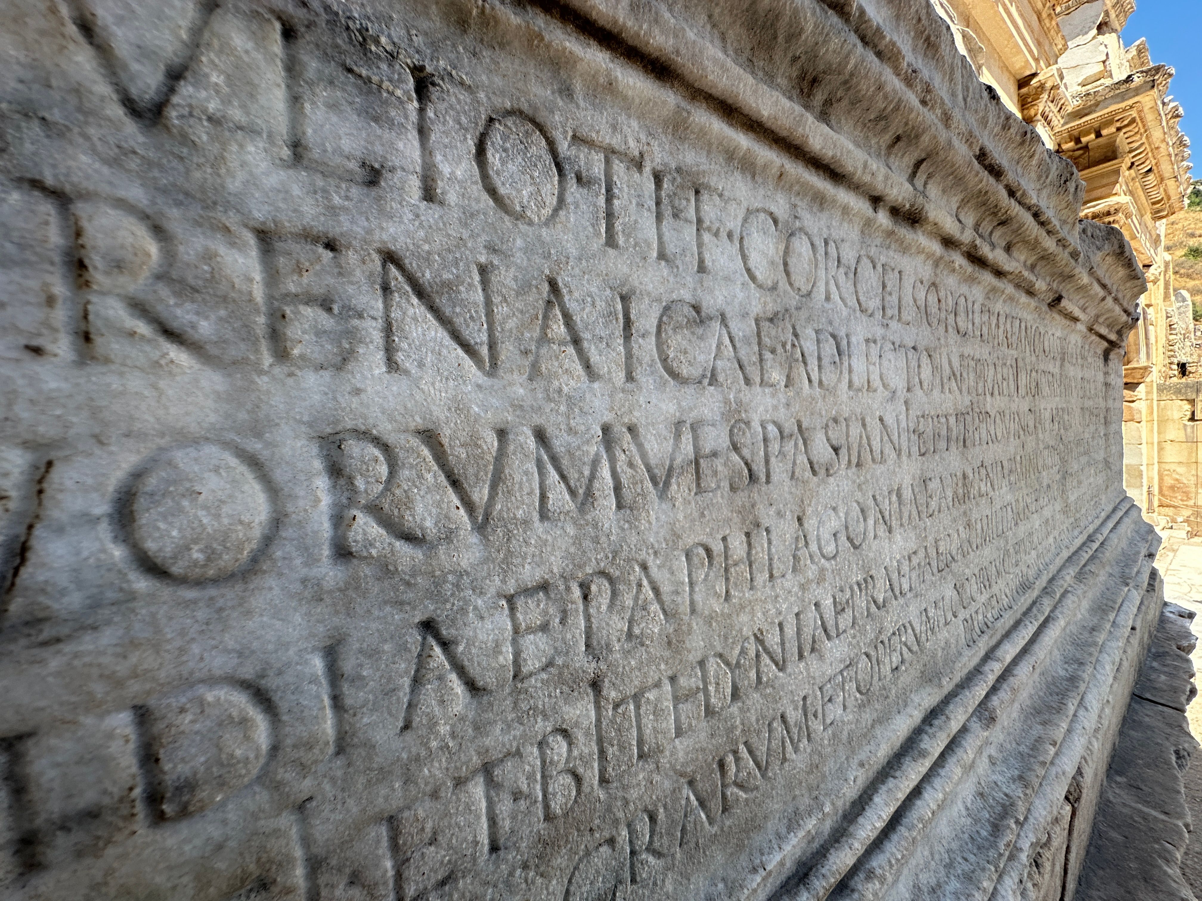 latin text carved stone