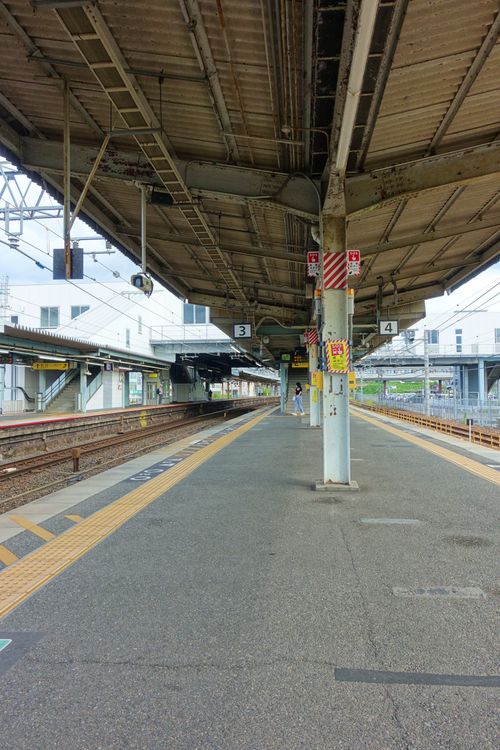 Free A serene view of Omi Jingu Mae Station platform in Shiga, Japan with no people around. Stock Photo