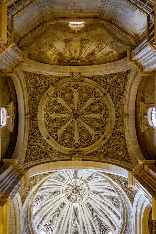 Free Stunning detailed view of ornately carved ceiling inside Granada Cathedral, Spain. Stock Photo