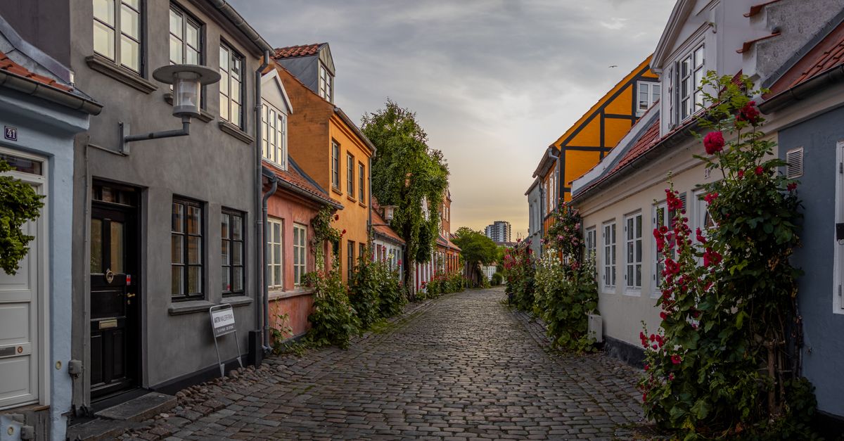 quiet cobblestone village in Eastern Europe at sunrise