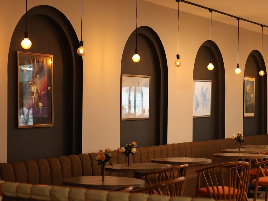 Cozy cafe interior with warm pendant lights