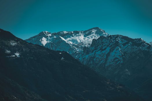 Discover the breathtaking snow-capped peaks in Pianello del Lario, capturing the essence of pristine natural beauty.