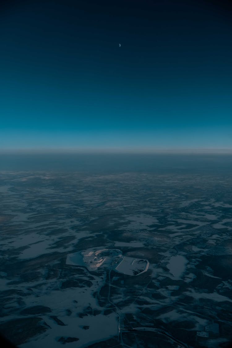 Aerial View From Great Height On Terrain With Ponds