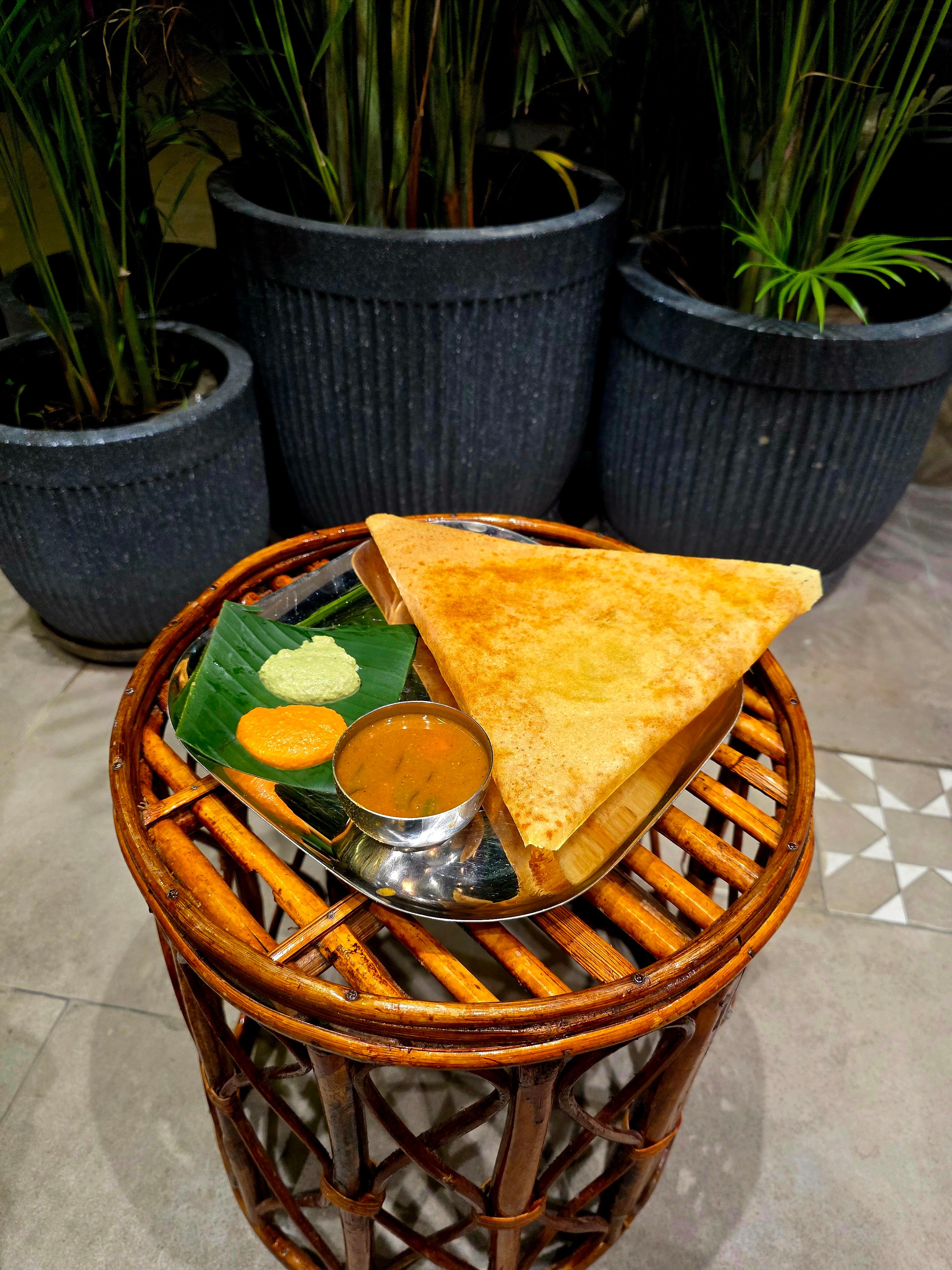 Crispy dosa with chutneys and sambar