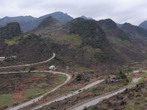 Free Scenic view of winding mountain road and rural landscape in Vietnam. Stock Photo