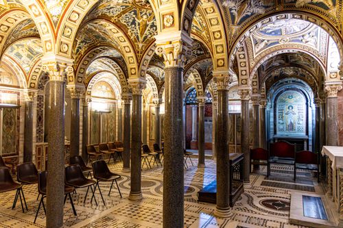 Free Intricately decorated chapel interior with arches and frescoes in Rome. Stock Photo