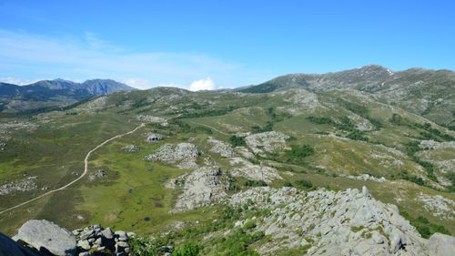 Free Scenic mountain landscape in Aullène, Corse, France, showcasing vast open spaces and rugged terrain. Stock Photo