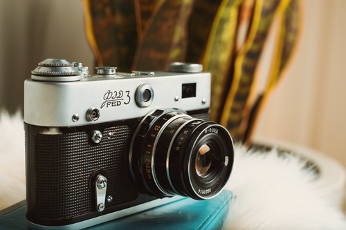 Free Close-up of a classic FED 3 rangefinder camera with a retro design, ideal for nostalgia. Stock Photo