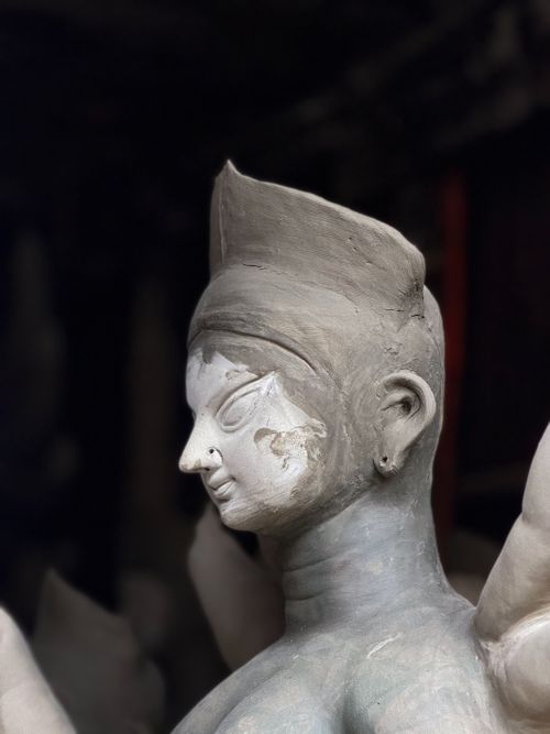 Free Close-up of an unfinished clay idol in a Kolkata artisan workshop. Stock Photo