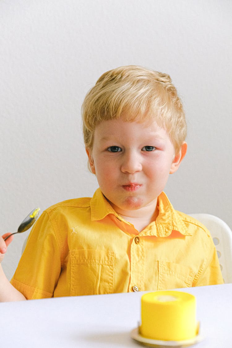 Boy Eating Cake