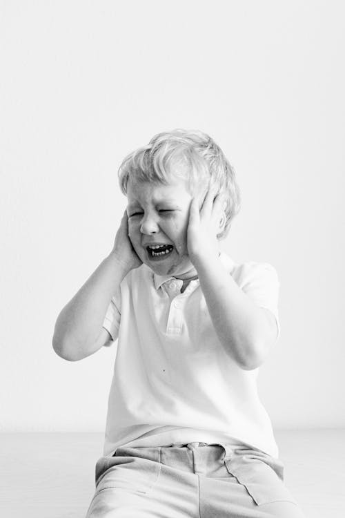 Free Grayscale Photo Of a Boy Crying Stock Photo