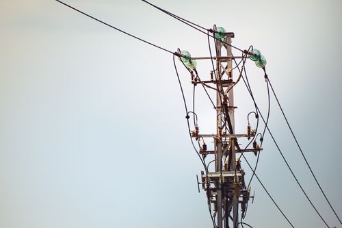 Free Close-up of high voltage power lines against the sky in Kunming, Yunnan, China. Stock Photo
