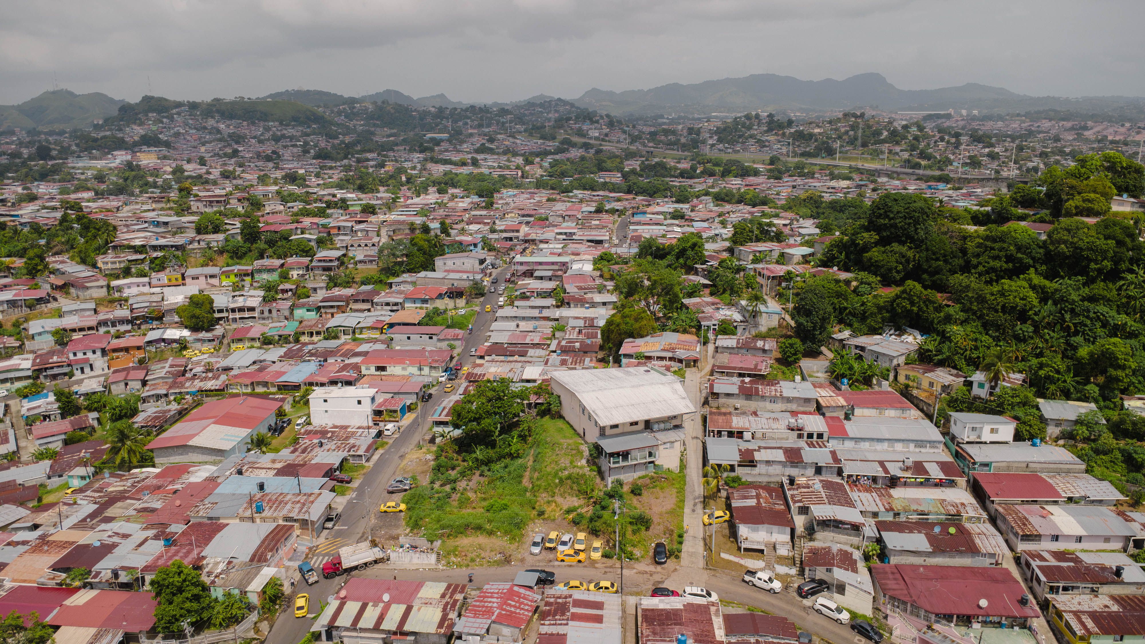 Aerial view of the vibrant urban landscape in San Miguelito, Panama, showcasing residential architecture.