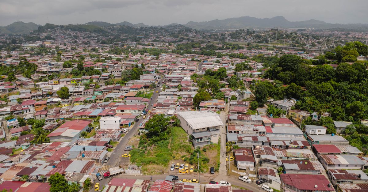 Aerial view of the vibrant urban landscape in San Miguelito, Panama, showcasing residential architecture.