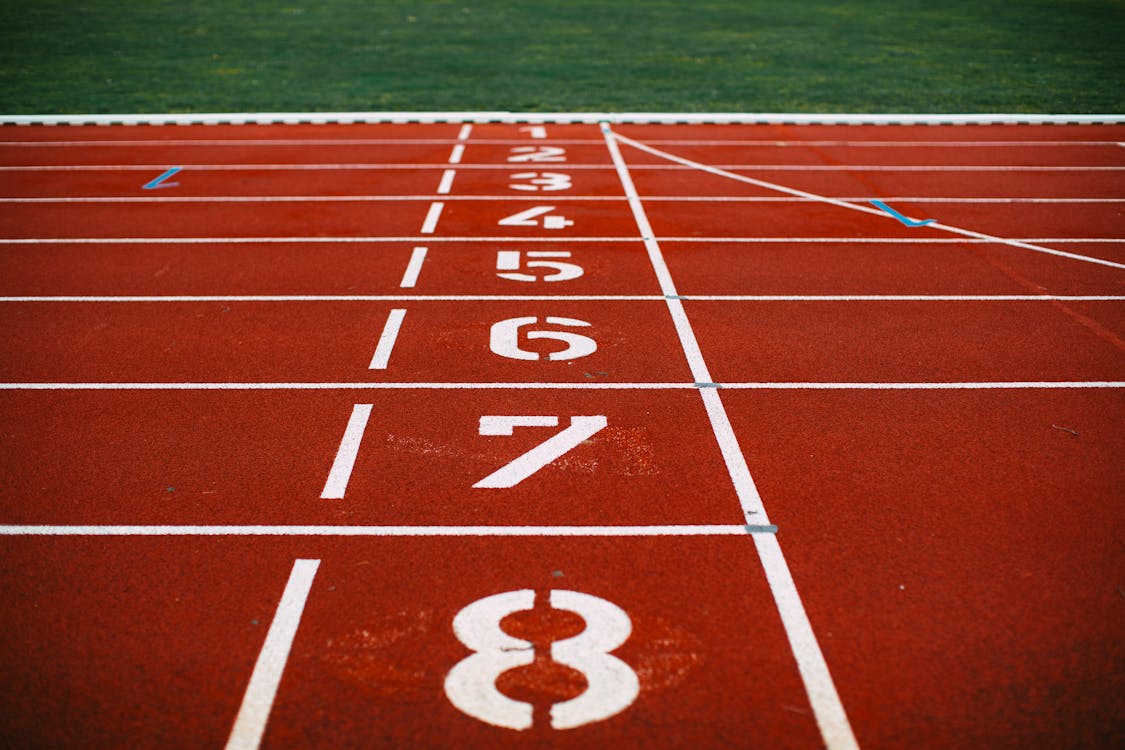 Free White and Red Track Field Stock Photo
