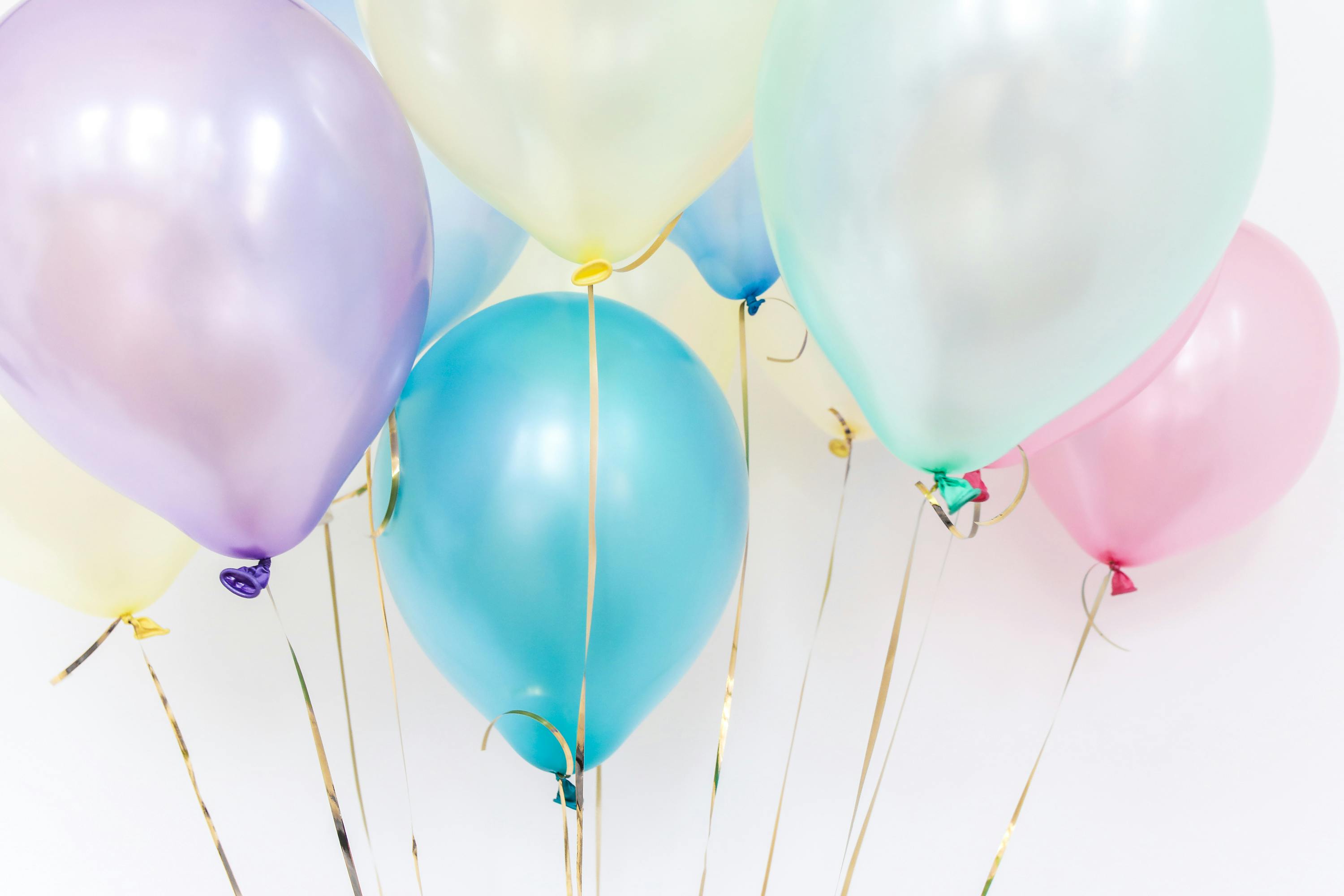 Hanging Colorful Balloons on a String · Free Stock Photo