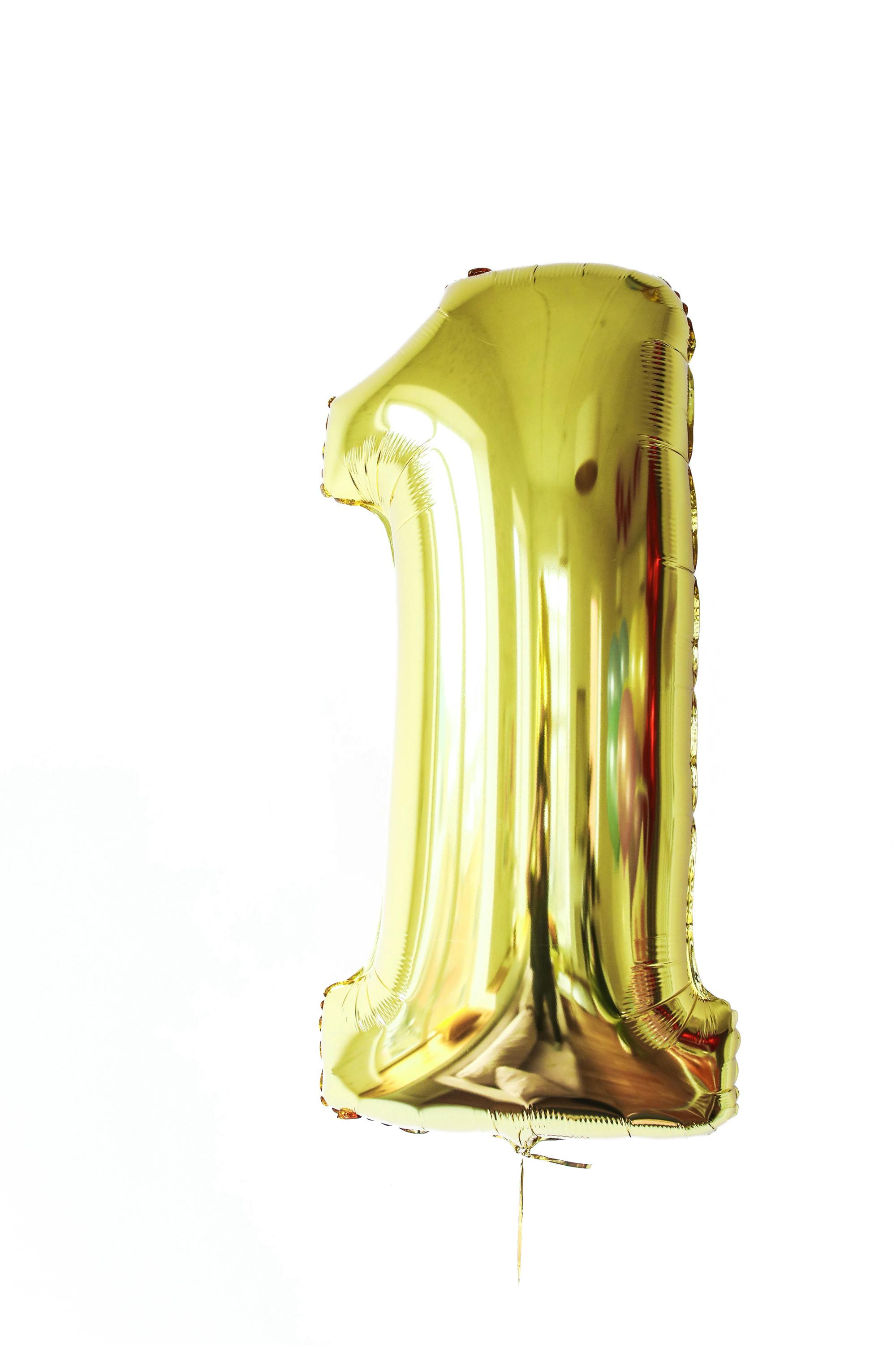 gold number balloon on white background