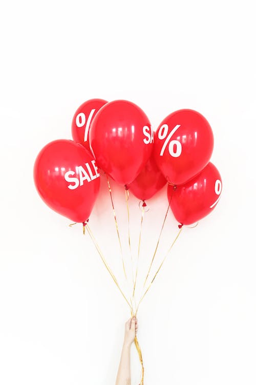 Red Balloons On White Background