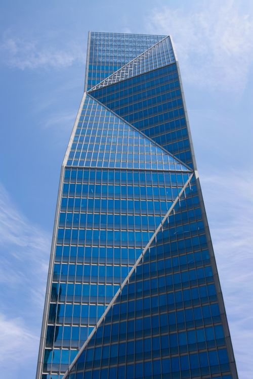 Free Striking view of a glass skyscraper in La Défense district, Paris. Stock Photo