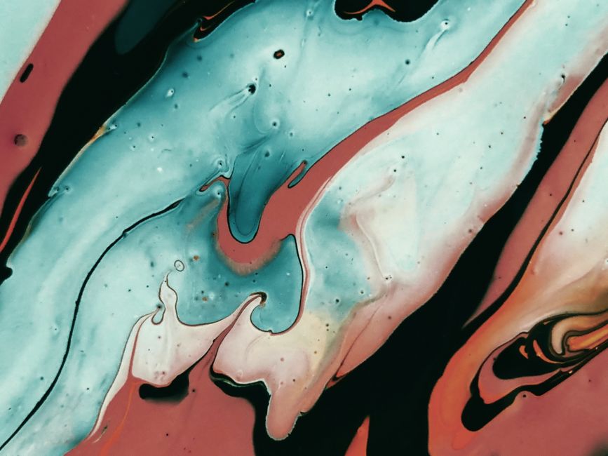 Vibrant abstract fluid art with swirling colors creating a dynamic and artistic expression.