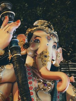 Close-up of a beautifully decorated Lord Ganesha idol during the Ganesh Chaturthi festival in Mumbai, India.