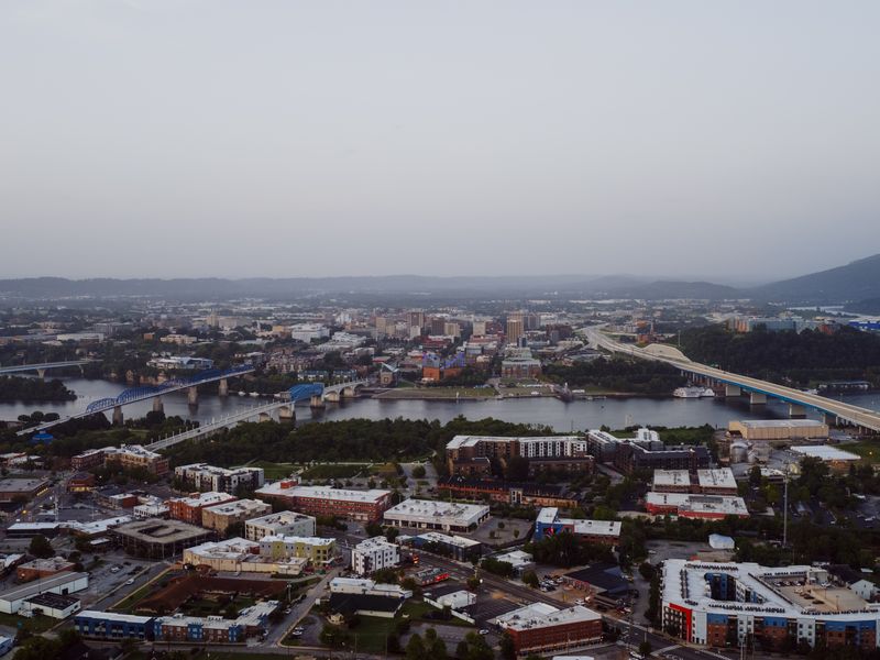 Aerial view of Chattanooga, Tennessee with the river and its bridges at dusk