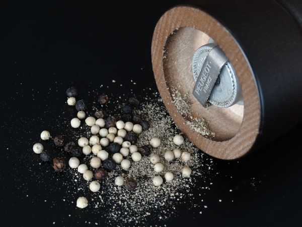 Wooden pepper mill with peppercorns by Pixabay on Pexels