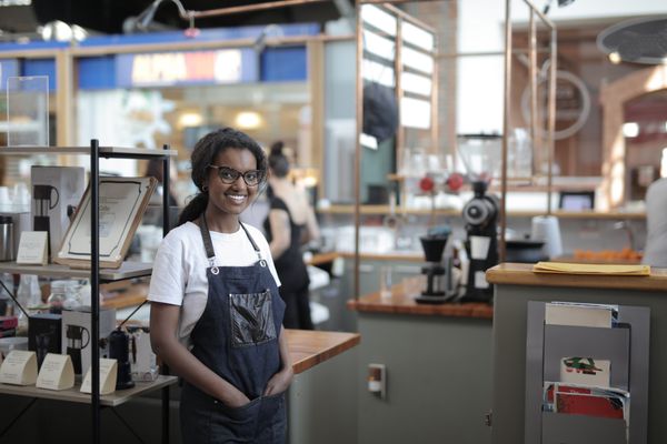 Business owner in her shop, grown past the spreadsheet stage