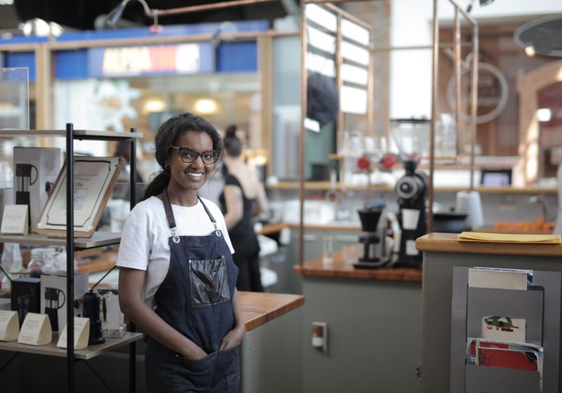 A café owner in her shop