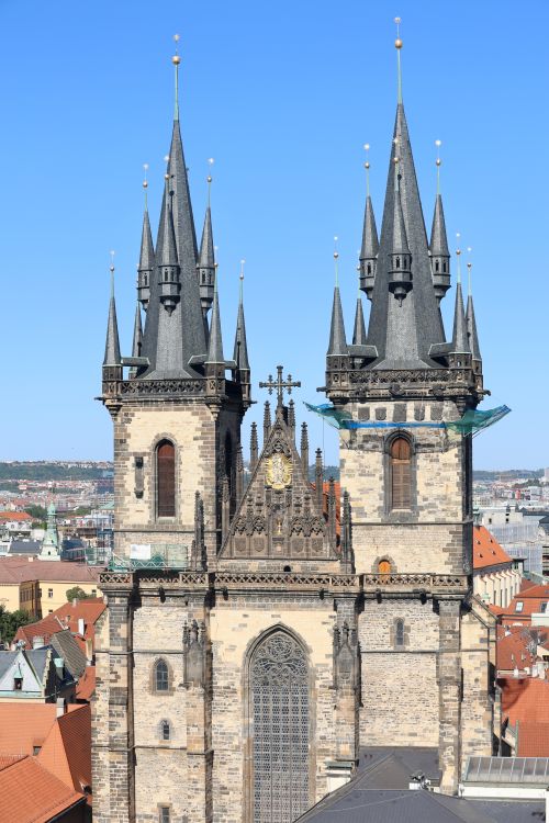 Free Stunning view of the Gothic Church of Our Lady before Týn against a clear blue sky in Prague, Czech Republic. Stock Photo
