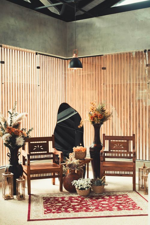 Free Elegant rustic wedding setup with wooden chairs and dried flowers in São Paulo, Brazil. Stock Photo