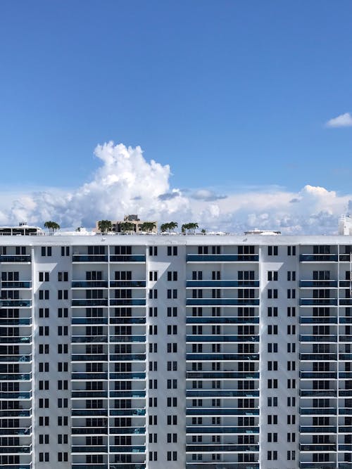 Multistory Concrete Building Under Blue Sky