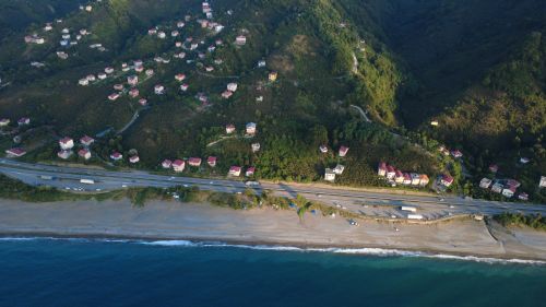Free A stunning aerial shot of a coastal village and beach along the Turkish Black Sea region. Stock Photo
