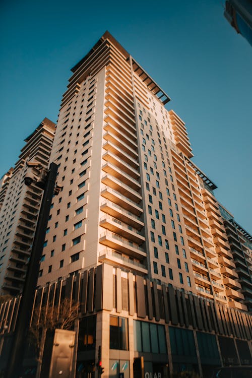 Brown Concrete Building Under Blue Sky